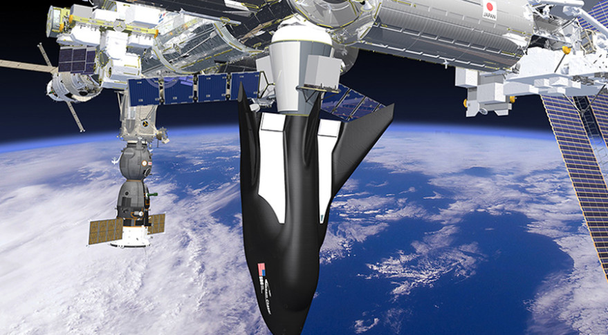 A cargo version of Sierra Nevada Corp.'s Dream Chaser vehicle attached to the International Space Station in this illustration. Credit: Sierra Nevada Corp.