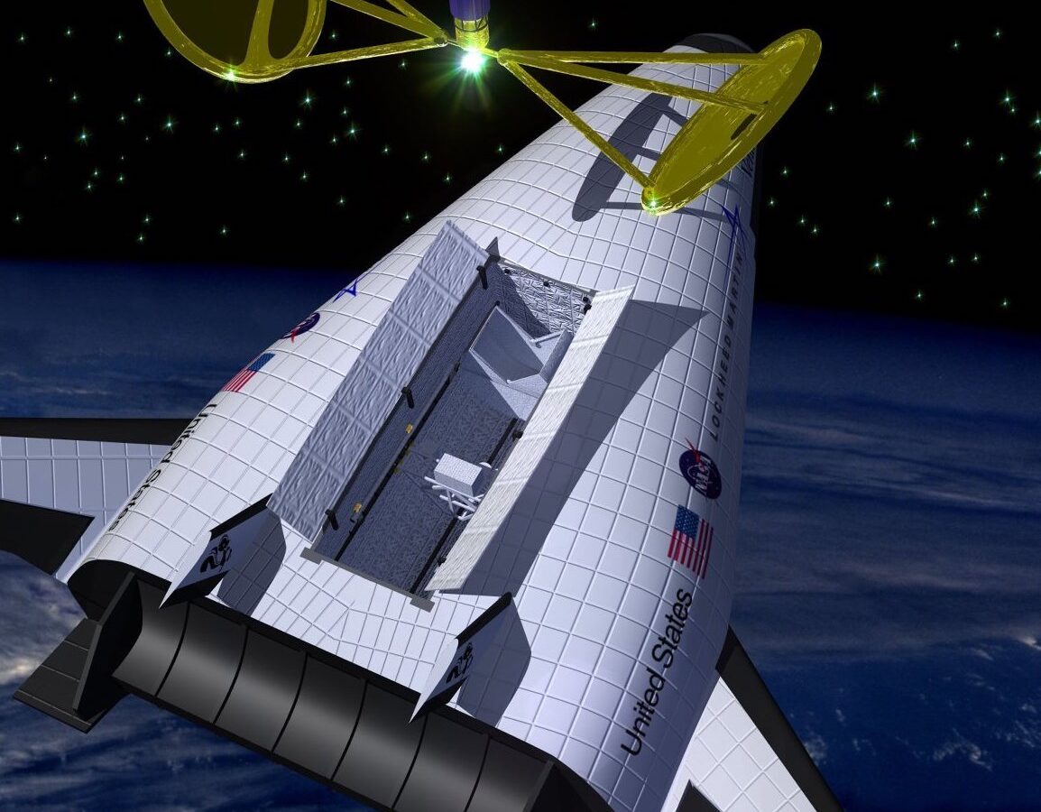 artist's concept of X-33 reusable launch vehicle deploying a satellite.