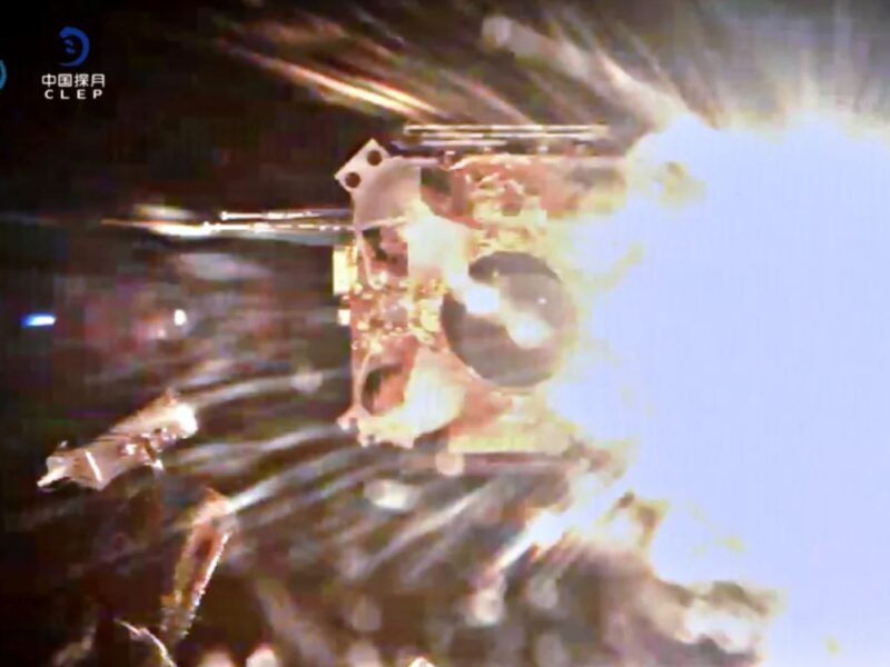 A view from the Chang'e-5 lunar lander as the ascent vehicle lifts off on Dec. 3, with glare from the Sun. It will attempt rendezvous and docking Dec. 5, 2020.