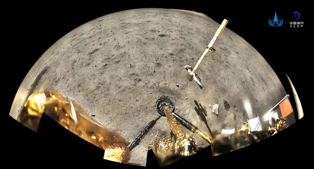 A panorama returned by the Chang'e-5 lander, showing robotic sampling arm and scoop marks in lunar regolith.