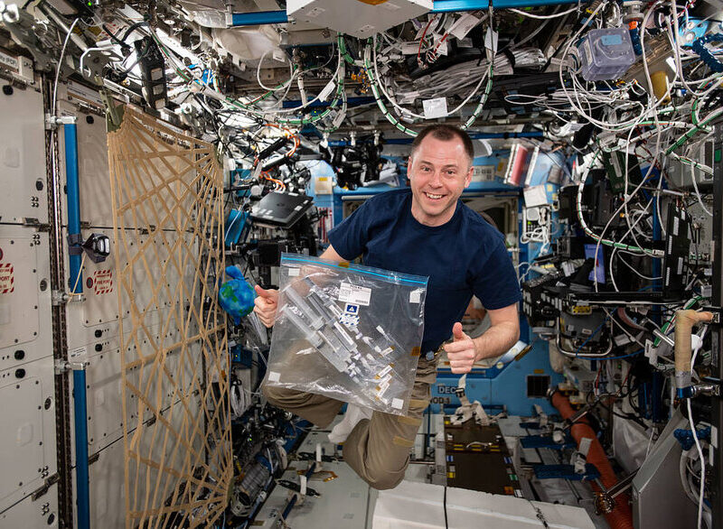 NASA astronaut Nick Hague is photographed with a CASIS