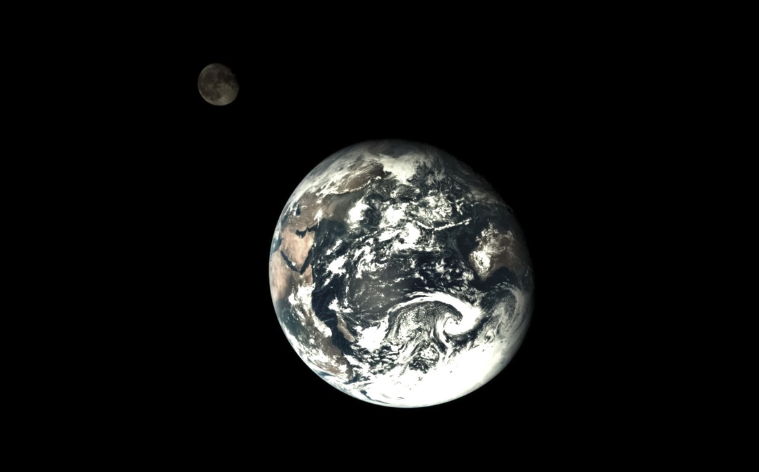 The Earth and distant moon imaged by the Chang'e-5 T1 service module. A rocket upper stage that launched the mission is thought to be the object due to impact the moon in March 2022.