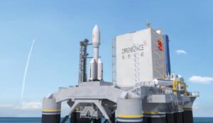 An illustration of the Orienspace "Gravity-1" launch vehicle on a sea launch platform.