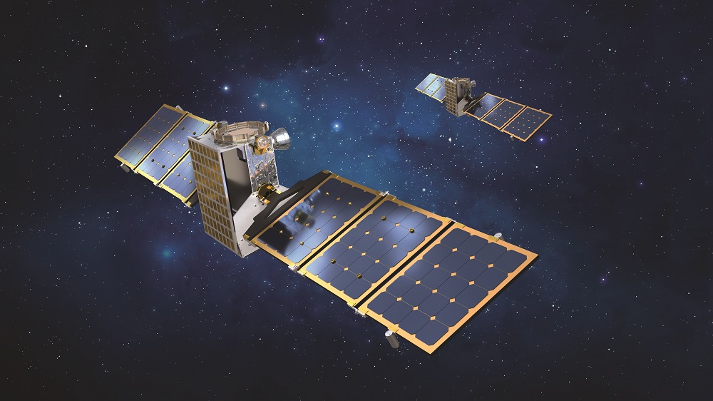 An illustration of a pair of rectangular satellites with rectangular solar arrays against a starry dark blue background.