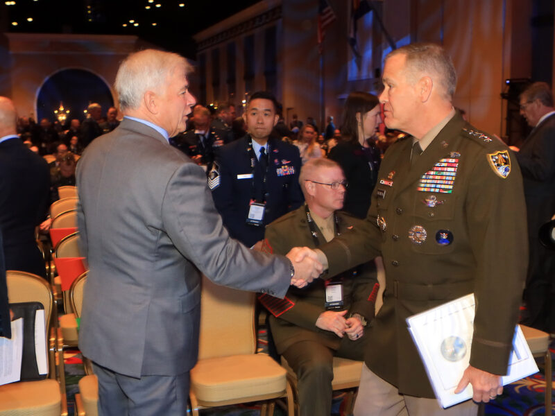 Gen. James Dickinson, head of U.S. Space Command (right) speaks with industry officials and military allies at the Space Symposium. Credit: Tom Kimmell