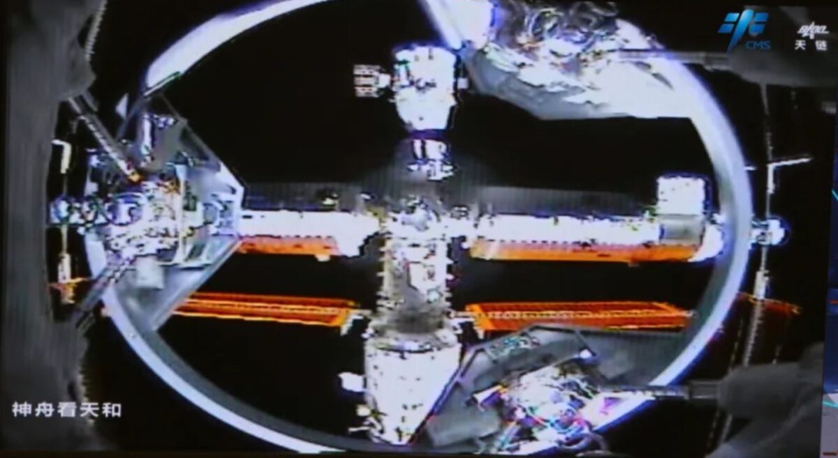 A view from the Shenzhou-16 docking system as it approaches its docking port on the orbiting Tianhe module.